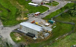 Aerial reality model of an industrial facility and surrounding infrastructure generated from captured site imagery.