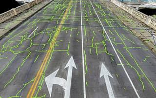 AI-powered crack detection on a 3D reality model of a road processed by iTwin Capture Cloud Services.