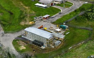 Aerial reality model of an industrial facility and surrounding infrastructure generated from captured site imagery.