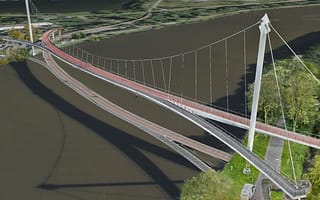 A high-fidelity 3D reality model of a modern bridge over a river, created with iTwin Capture Engine.