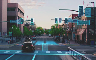 Blyncsy using AI to automatically detect and inventory roadway assets like traffic signals and signs on a city street.