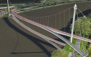 A high-fidelity 3D reality model of a modern bridge over a river, created with iTwin Capture Engine.