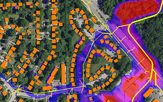 Hydraulic modeling in OpenFlows Sewer showing urban flooding simulation from a sewer system.