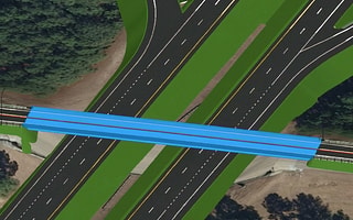 Conceptual road and bridge design created in OpenRoads ConceptStation and visualized in a real-world context.