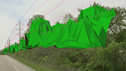 Green 3D polygons overlay trees beside a road, illustrating where vegetation intersects with America power line clearance zones—showcasing how tech helps build safer, more efficient infrastructure.