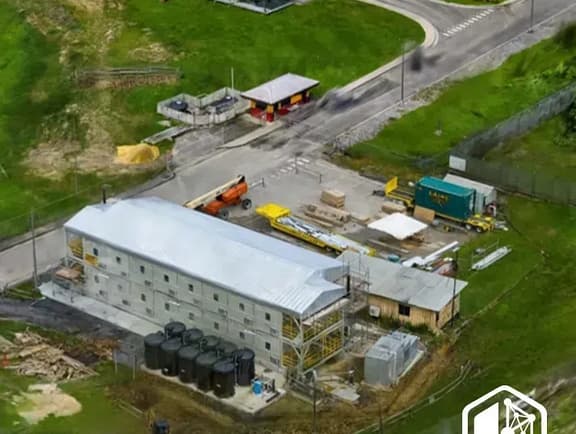Aerial reality model of an industrial facility and surrounding infrastructure generated from captured site imagery.