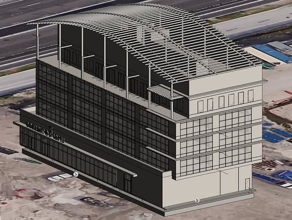 A high-fidelity 3D CAD architectural model of a modern multi-story commercial building, 'Gourmet Lofts,' featuring glass facade paneling and a large curved trellis roof structure, displayed inside Bentley View.