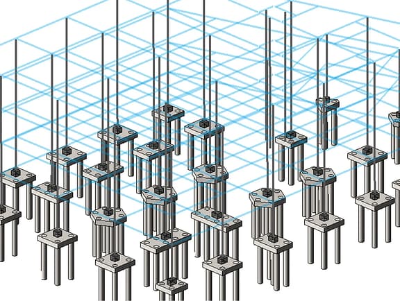 Grid layout of pile caps and deep foundation piles in STAAD Foundation Advanced. A blue wireframe building column grid aligns with concrete pile foundations for structural soil-structure interaction analysis.