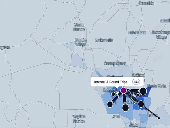 Origin-destination traffic demand analysis on a GIS map in OpenPaths Patterns, displaying travel path flow vectors and trip volumes between municipal zones.