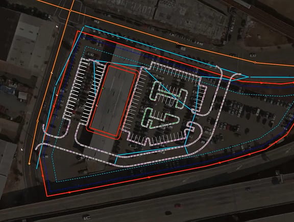 The OpenSite Designer interface displaying automated site grading optimization, earthwork volume comparisons, and stormwater drainage design.