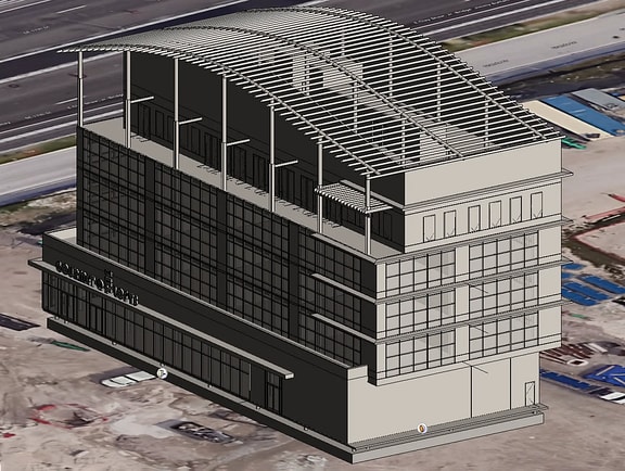A high-fidelity 3D CAD architectural model of a modern multi-story commercial building, 'Gourmet Lofts,' featuring glass facade paneling and a large curved trellis roof structure, displayed inside Bentley View.