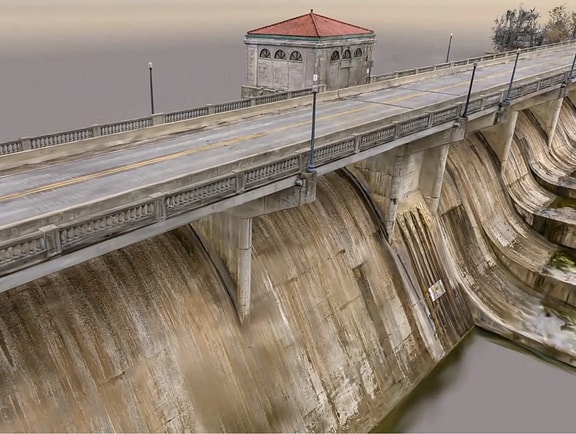High-resolution 3D reality mesh of a concrete dam and bridge deck generated by iTwin Capture Cloud Services, illustrating precise structural documentation and asset capture.