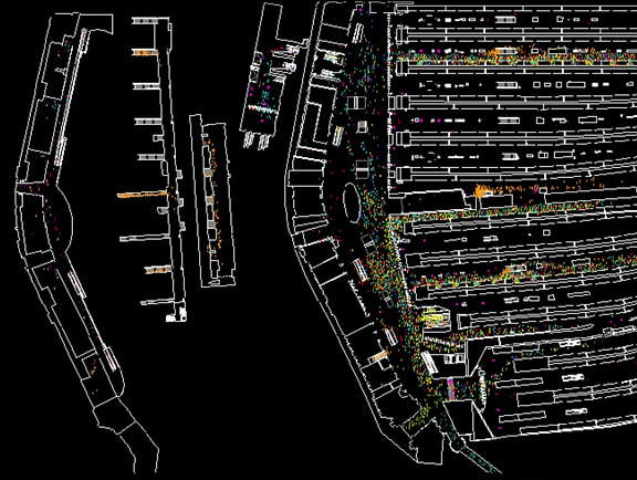 LEGION crowd simulation software screen displaying a detailed CAD layout of a transit station with color-coded dot particles modeling pedestrian flow, travel paths, and potential bottlenecks.
