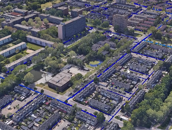 3D view of a residential area with a blue water pipe network overlaid on the streets and buildings