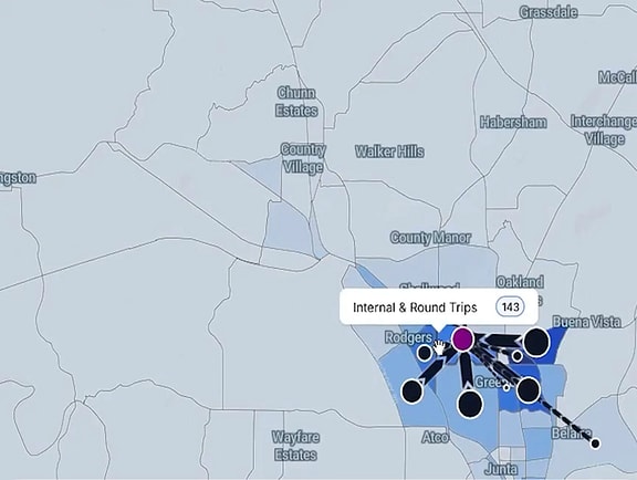 Origin-destination traffic demand analysis on a GIS map in OpenPaths Patterns, displaying travel path flow vectors and trip volumes between municipal zones.