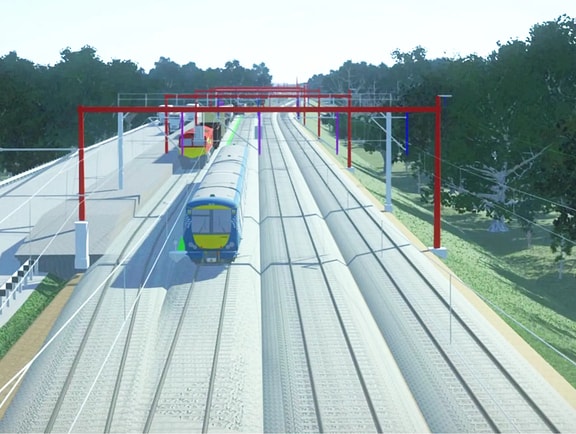 High-speed rail design model in OpenRail Designer, showcasing dual railway tracks, red overhead gantries, and a blue passenger train in a digital corridor landscape.