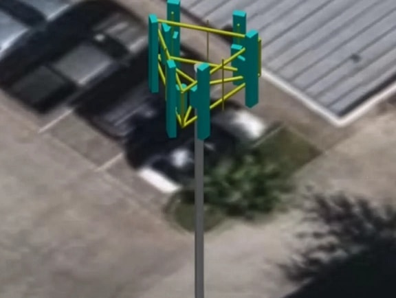 A 3D digital twin model of a triangular telecommunications antenna platform with green mounts designed in OpenTower iQ.