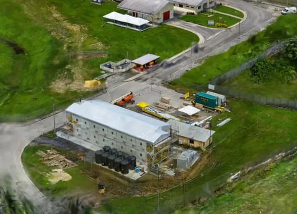 Aerial reality model of an industrial facility and surrounding infrastructure generated from captured site imagery