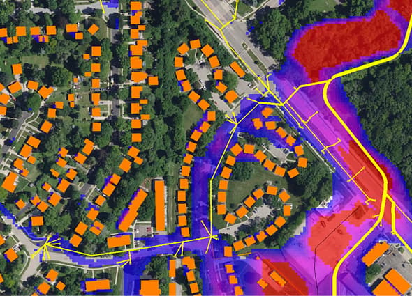 Hydraulic modeling in OpenFlows Sewer showing urban flooding simulation from a sewer system.