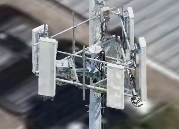 A close-up 3D model of a telecommunications tower head in OpenTower Mount Analysis, illustrating complex brackets, cabling, and white panel antennas.