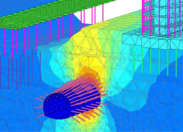 A complex 3D finite element geotechnical model depicting deep foundation systems, pile layouts, and surrounding soil deformation analysis in PLAXIS 3D.