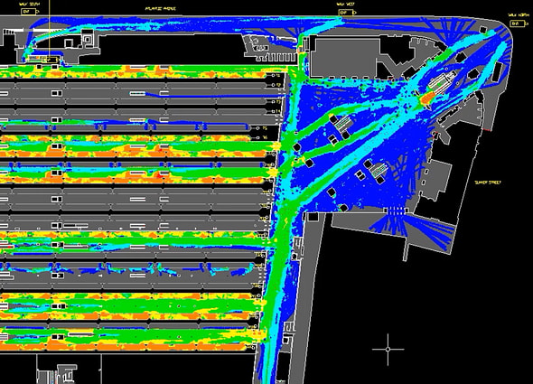 LEGION crowd simulation heatmap plotting pedestrian flow density inside a terminal facility, with green and blue tracks representing normal flow and yellow-red hotspots identifying congested zones.