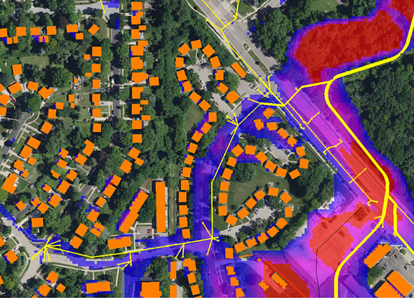 Hydraulic modeling in OpenFlows Sewer showing urban flooding simulation from a sewer system.