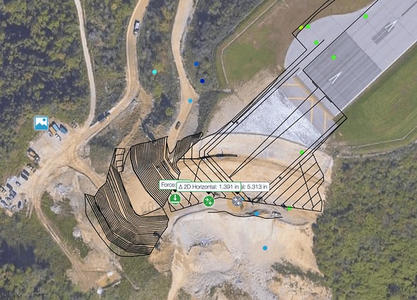 A dynamic hero dashboard from sensemetrics showing an active open pit mine map with real-time sensor nodes, displacement graphs, and environmental data plots.