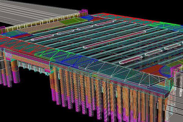 Colorful 3D CAD wireframe of a large bridge deck with layered beams, railings, and numerous vertical support columns, viewed from above.