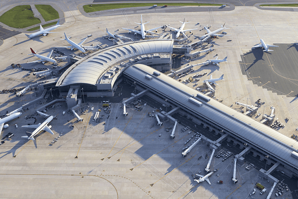 An aerial perspective of a modern, curved airport terminal with commercial airplanes at the gates, highlighting advanced aviation infrastructure, seamless air transit, and global passenger connectivity.