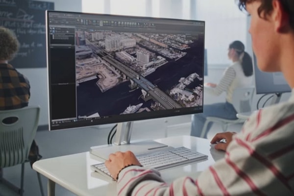 Man views screen showing software user interface