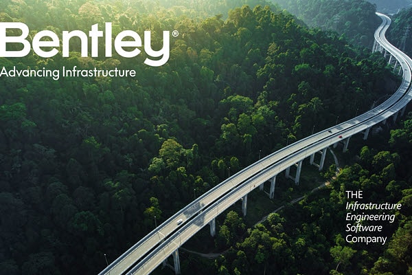 Words on top of aerial image of roadway and trees