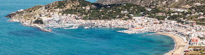 An aerial view of the coastal town of Port de la Selva, Spain, where an innovative project uses recycled wastewater to recharge the local aquifer and prevent seawater intrusion.