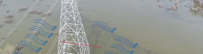 An image illustrating the flood conditions that EXO Grid addressed by retrofitting 44 transmission towers to withstand extreme weather and water loads.