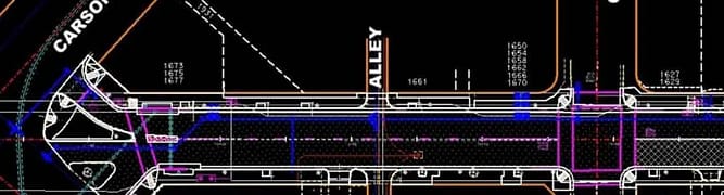 2D CAD drawing of a street intersection with detailed annotations for a city revitalization project. 