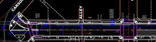 2D CAD drawing of a street intersection with detailed annotations for a city revitalization project. 