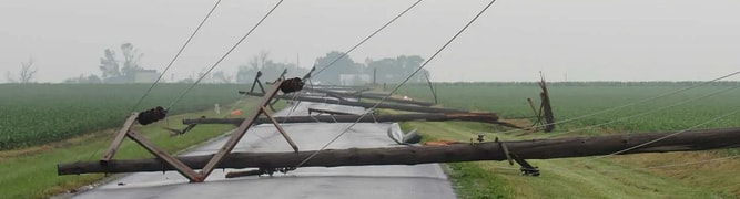The aftermath of an EF2 tornado, with 11 miles of a 69-kilovolt transmission line destroyed, which Toth redesigned for greater resiliency.