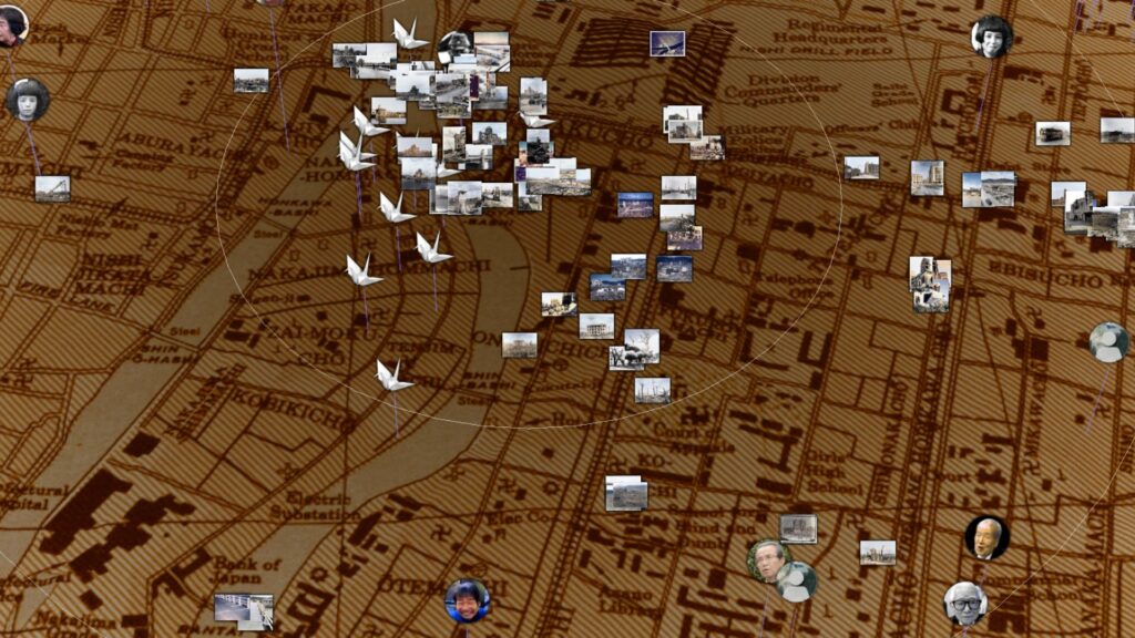 Collaged photos and portraits are arranged over a vintage map of Japan, with white origami cranes clustered near the center.