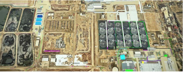 Aerial view of the Sacramento EchoWater Project, a major wastewater treatment facility under construction with multiple large storage tanks, buildings, and areas of bare earth.