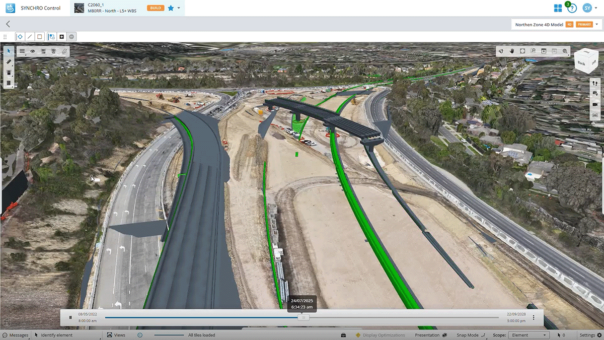 A digital 3D model of a highway construction site shows roads, overpasses, and surrounding landscape in a project management software interface.