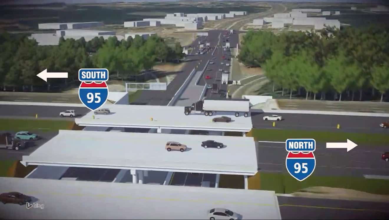 A digital rendering illustrates the design of an overpass with cars and trucks, labeled I-95 North and South, surrounded by trees and buildings&mdash;an ideal showcase for construction planning using digital twins.