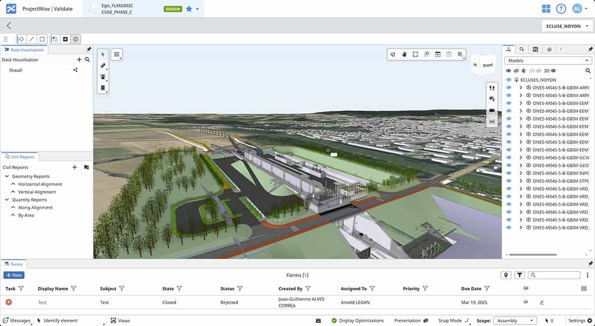 A digital 3D model of an infrastructure project is displayed in a project management software interface, showing building structures, roads, and surrounding landscape to enhance planning and collaboration.