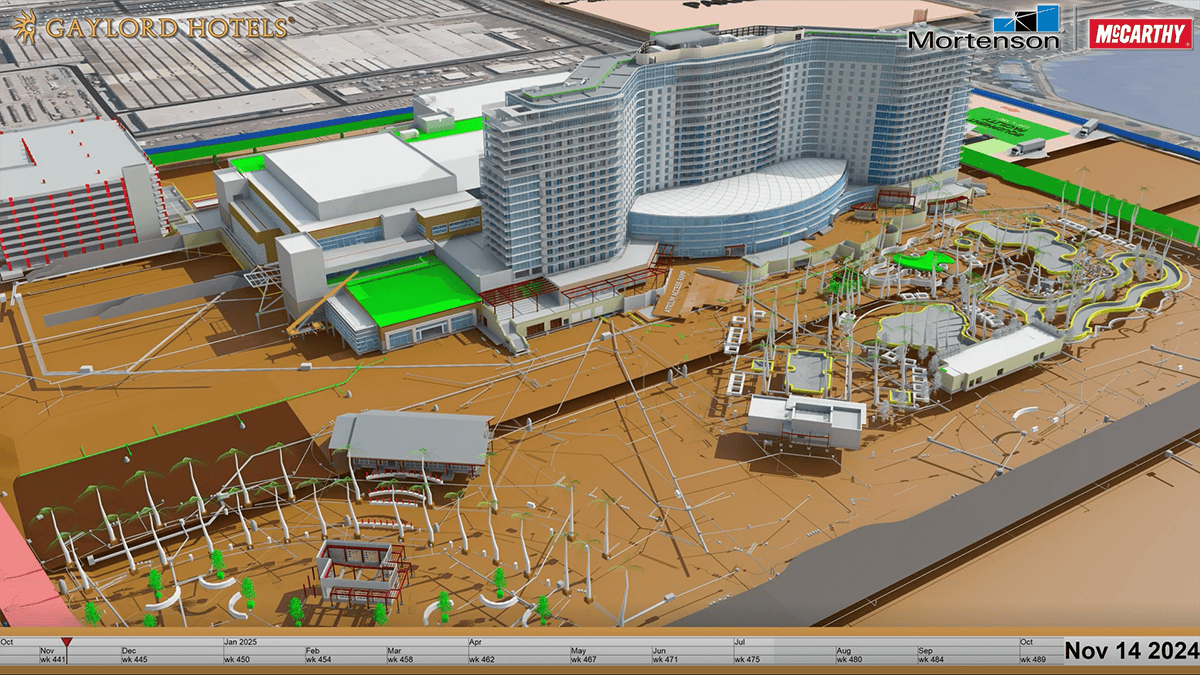 Digital rendering of the Gaylord Hotels complex under construction, featuring a large curved hotel building, adjacent structures, and a detailed outdoor area dated Nov 14, 2024.
