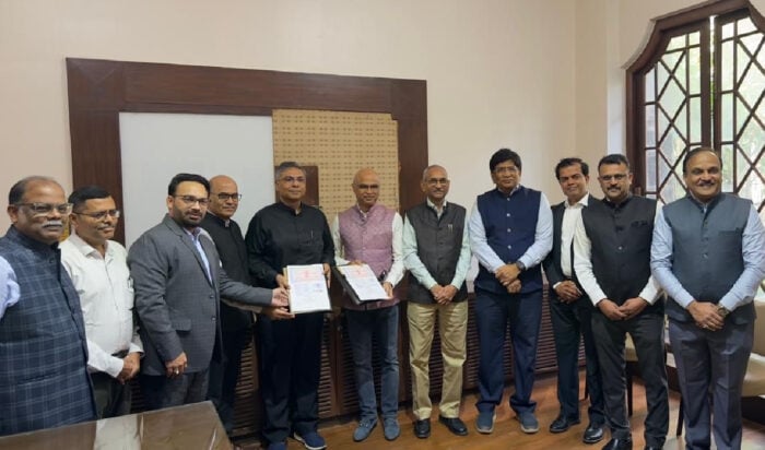 Team members from Bentley Systems and COEP Technological University sign MOU