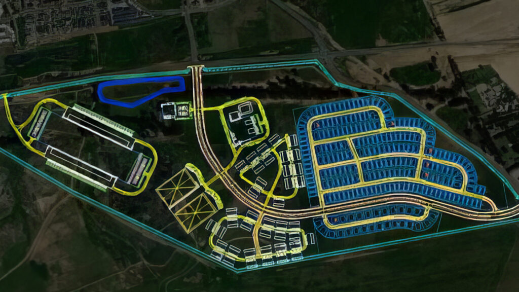 Satellite view of a race track and surrounding facilities outlined in neon colors on OpenSite.