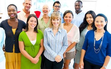 A group of people smiling