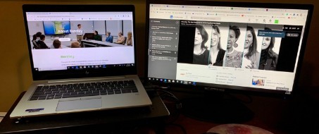 Laptop i monitor z witryną firmy Bentley
