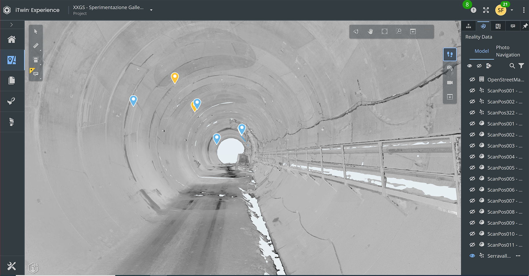 3D model view of a tunnel interior with design markers placed along the tunnel wall, and a list of scan files displayed on the right side of the screen.
