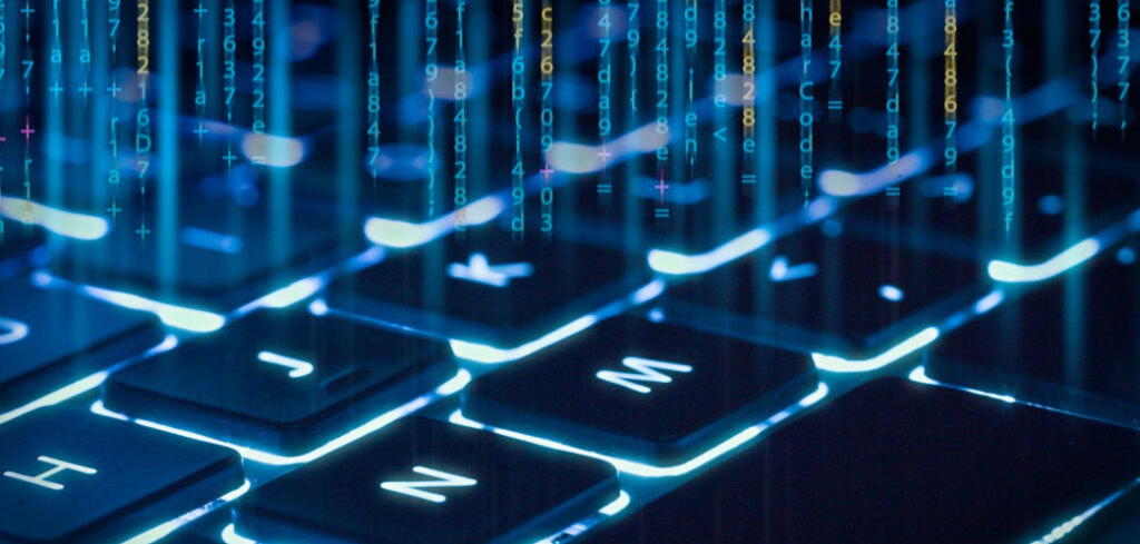 Close-up of an illuminated MicroStation keyboard with digital data streams rising from the keys, symbolizing advanced technology and computing.