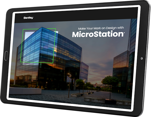 Tablet displaying 3d architectural software, "microstation," with an overlay graphic of a green building outline on cityscape background.
